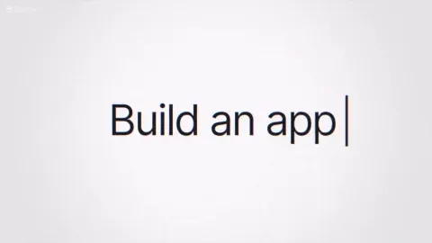 A white screen with the words Build an app and a typing cursor.